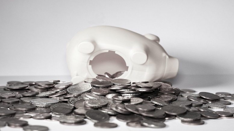 piggybank showing cash falling out to show you can save more money