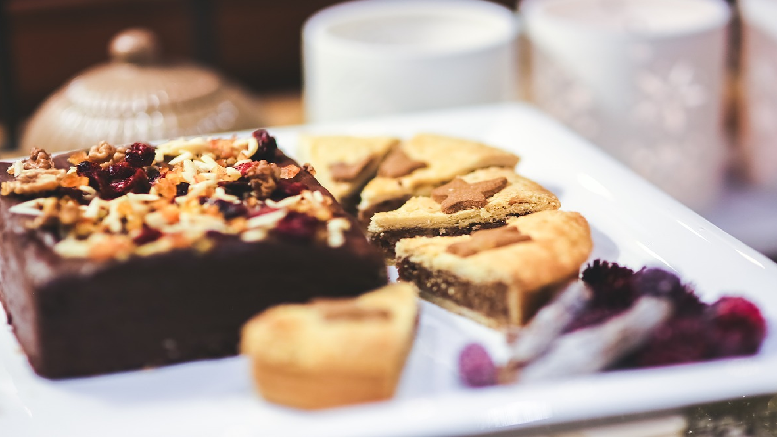 Mince pie brownies shown on a white plate