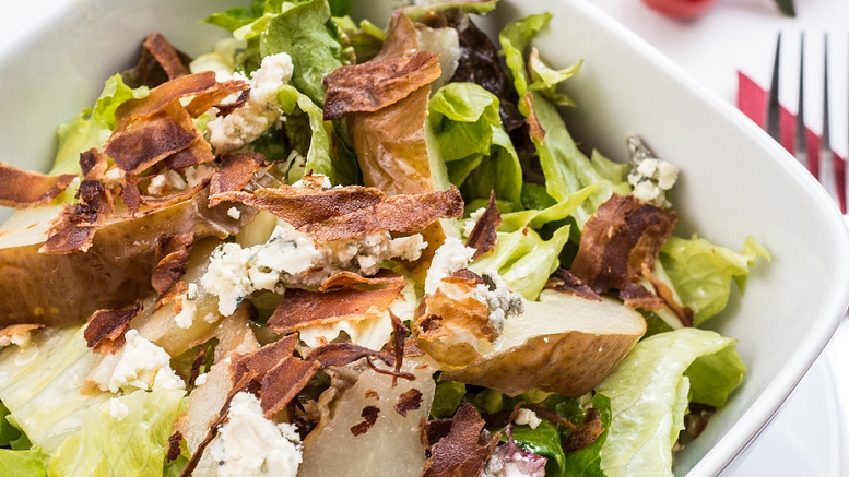 Caesar salad with roast chick and bacon