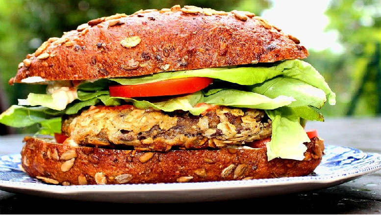 chorizo bean burgers shown on outdoors table