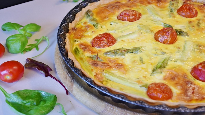 Image that shows a soft cheese frittata cooked with vegetables